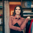 Fashionable Girl in Elegant Vintage Clothing Store