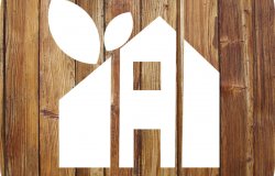 House icon on a wooden background