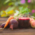 beet juice in glass on  table