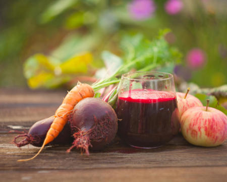 beet juice in glass on  table