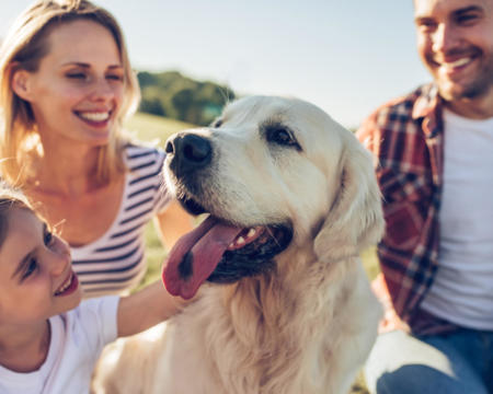 Happy family with dog