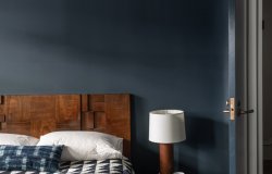 dark-blue-bedroom-painted-in-hague-blue