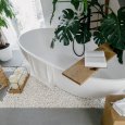 High,Angle,View,On,Modern,White,Bathtub,And,Wooden,Shelf